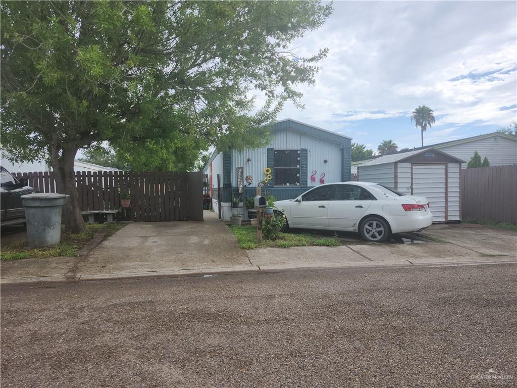 a car parked in front of a house