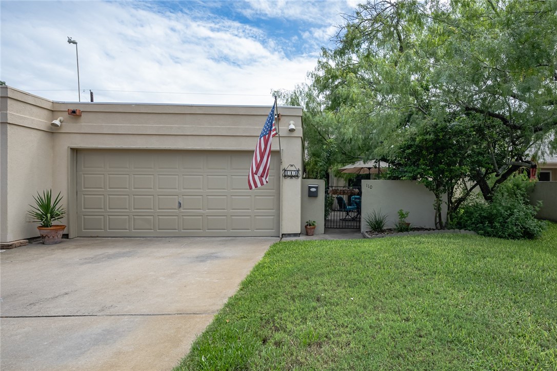 a view of a house with a garage