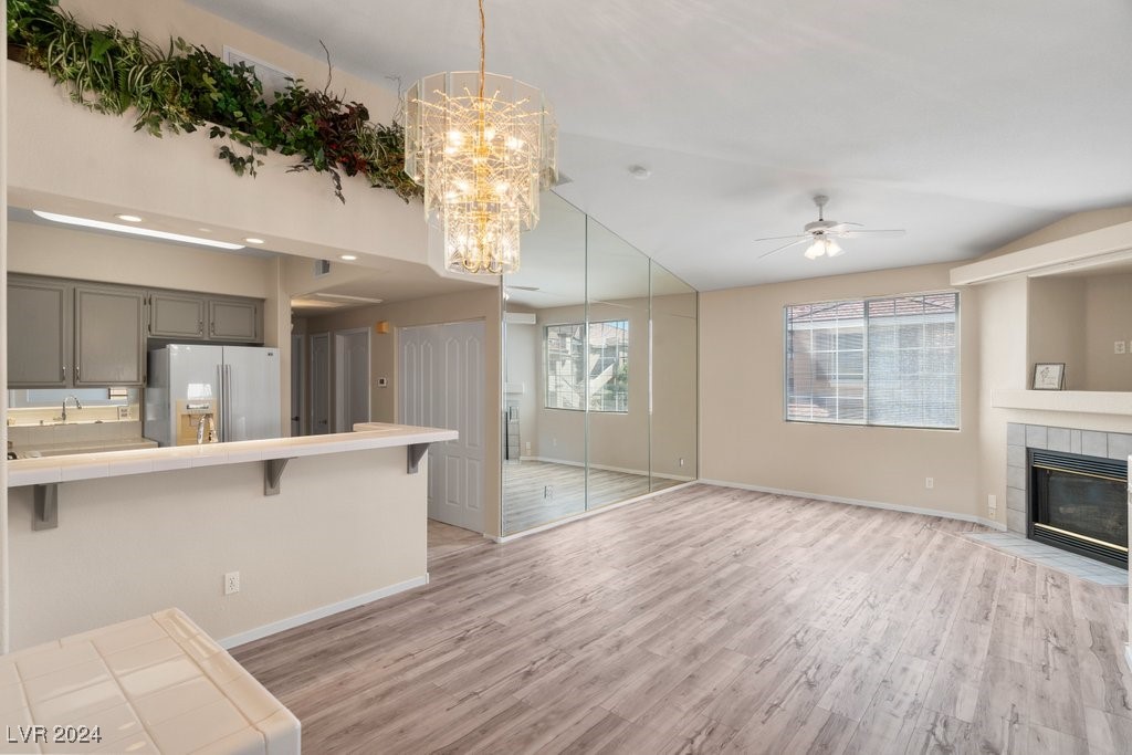 Natural light, cozy fireplace and breakfast bar cr