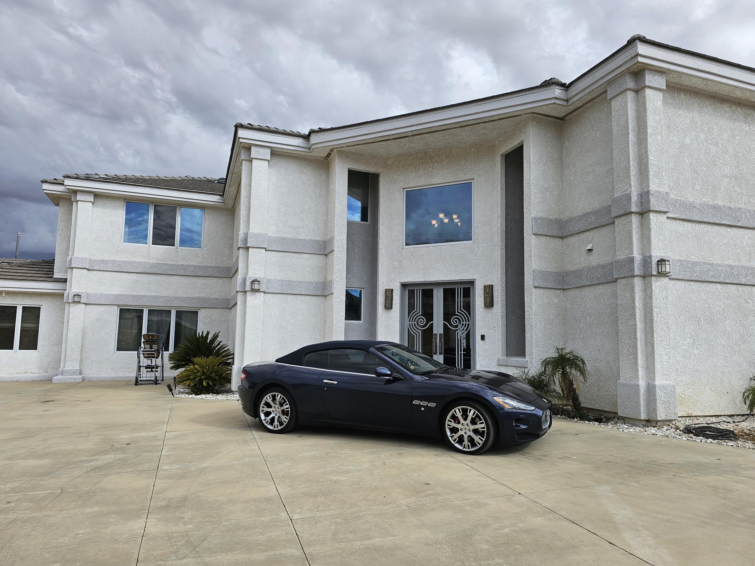 a car parked in front of a house