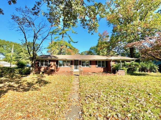 View of front of home featuring a front yard