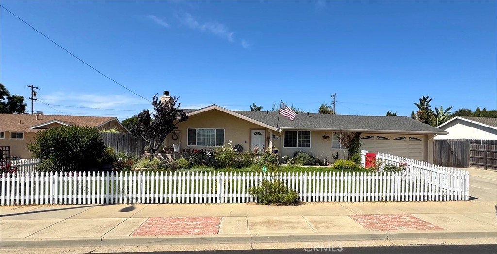 a house view with a garden space