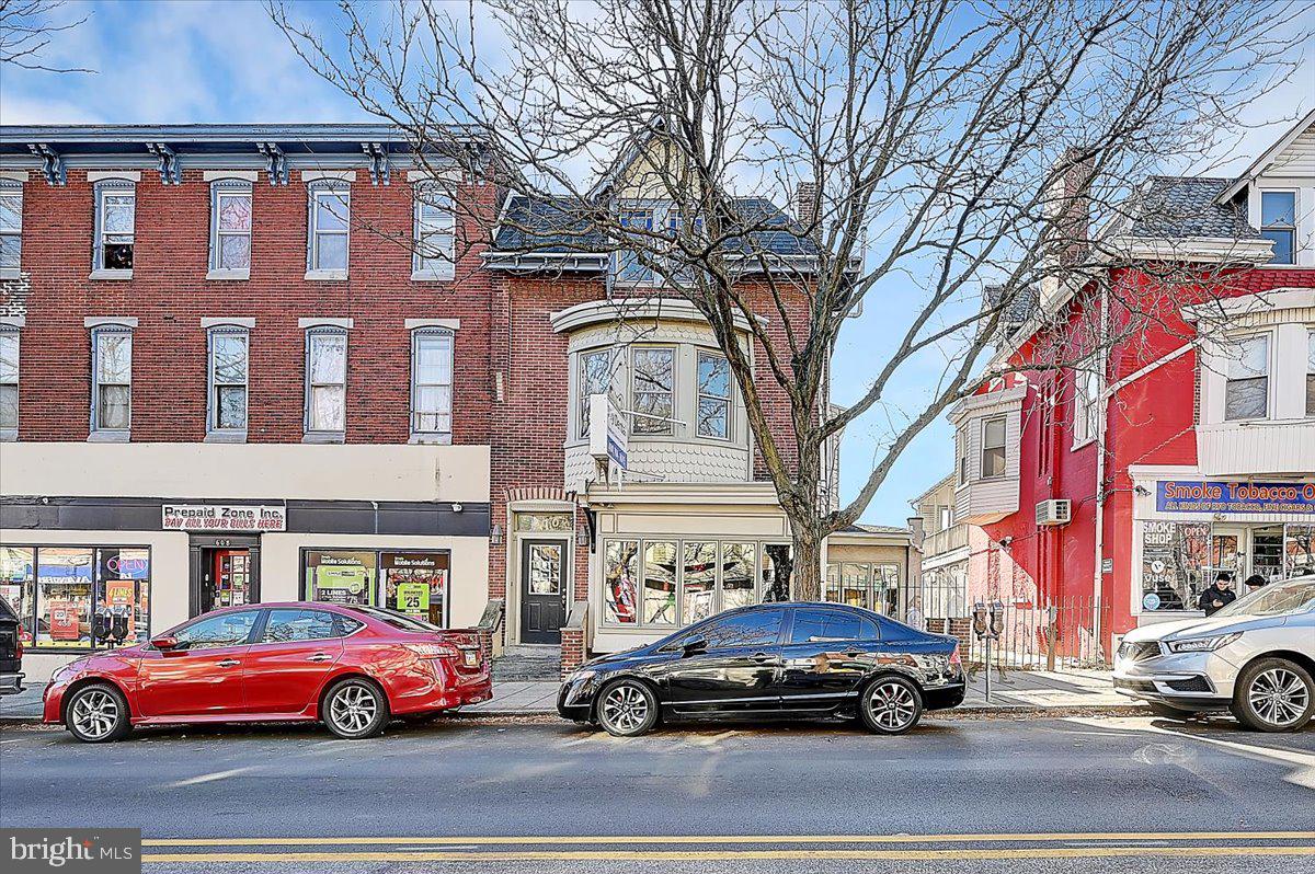 a cars parked in front of a building