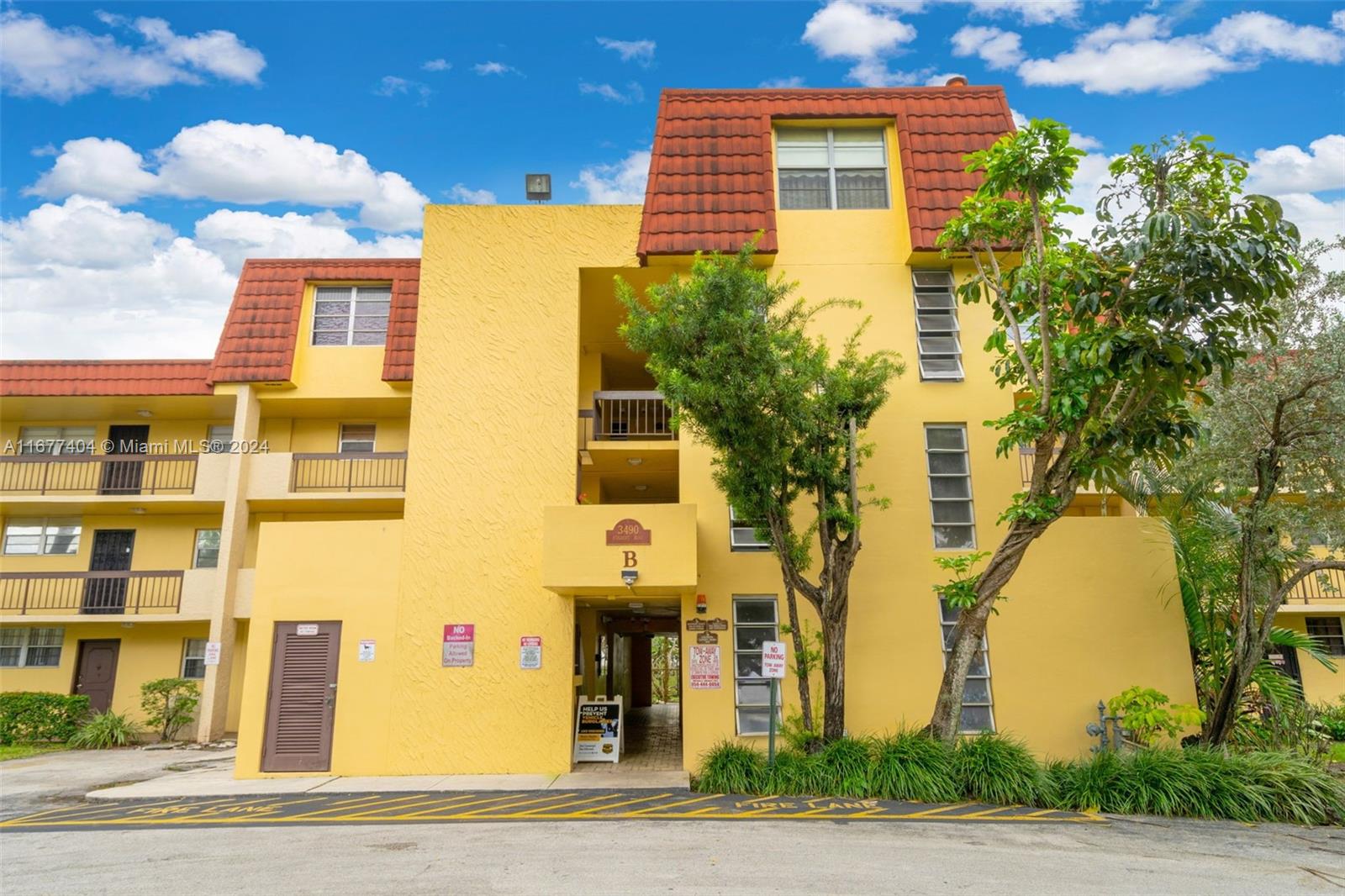 a front view of a multi story residential apartment building