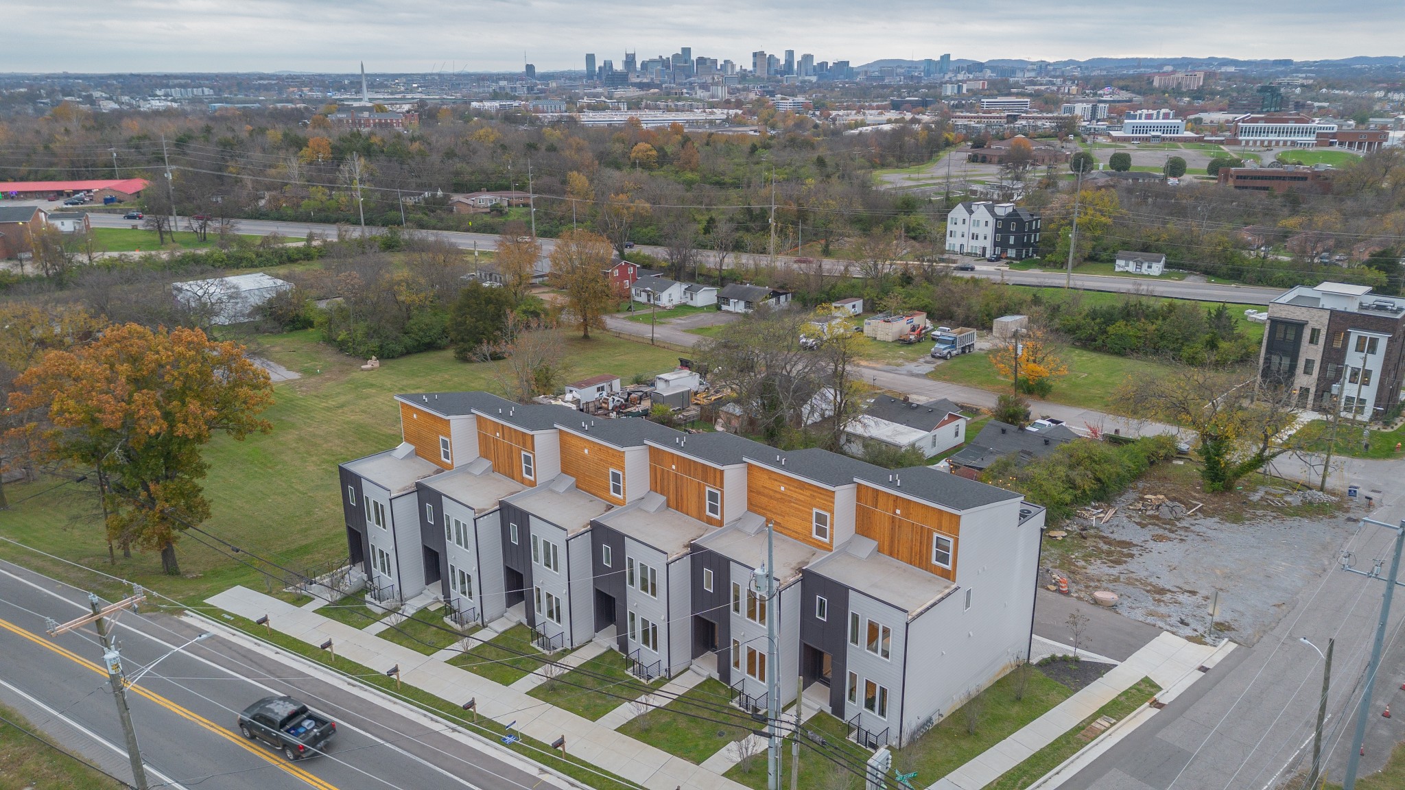 A breathtaking aerial view showcasing the proximity of the property to downtown Nashville, offering a glimpse of its urban skyline and surrounding neighborhood charm.