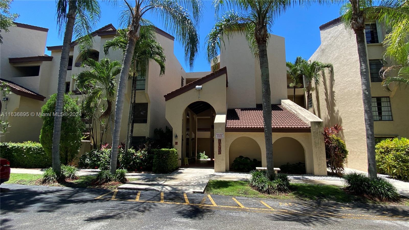 a front view of a house with outdoor space