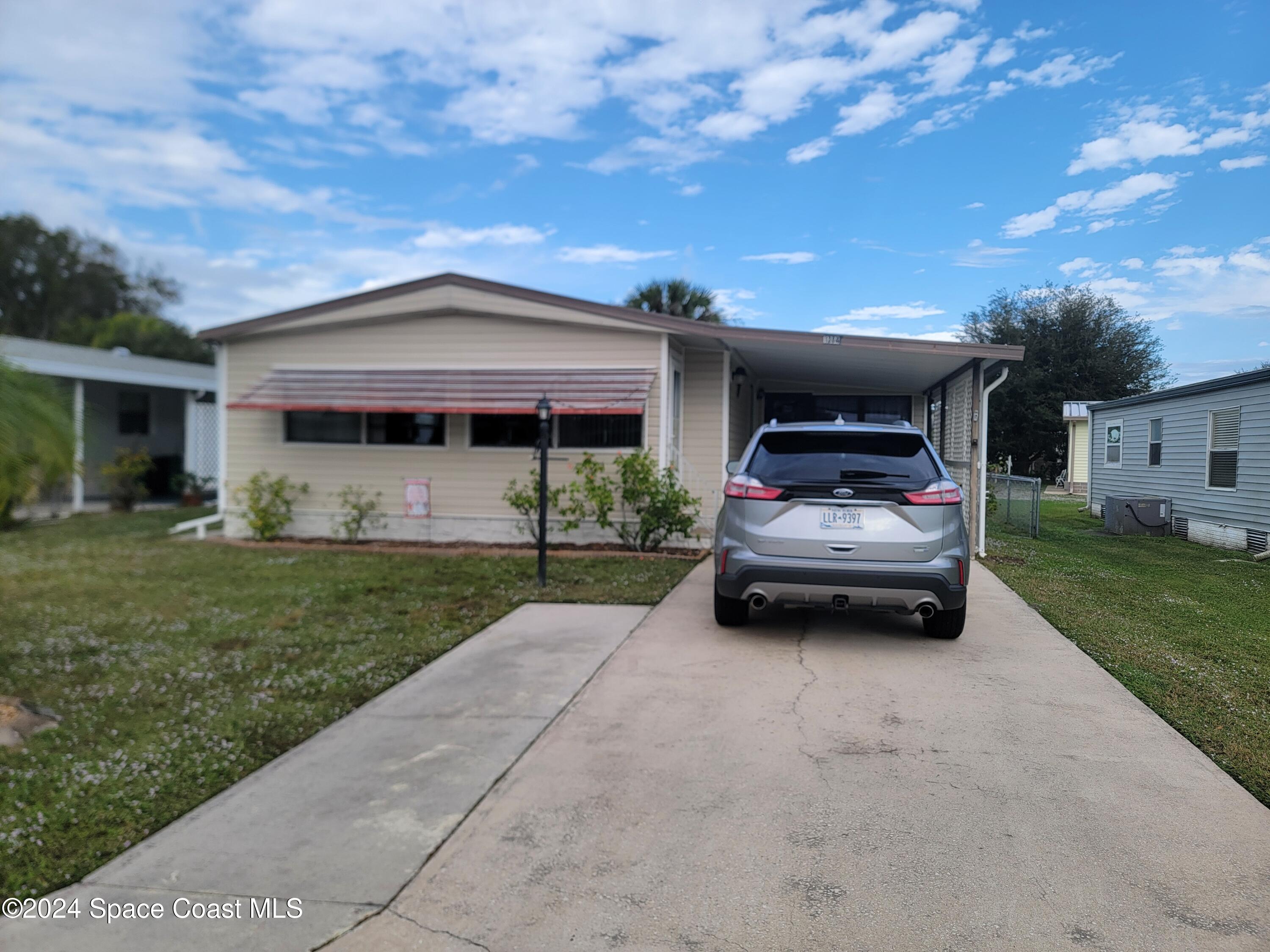 a car parked in front of house