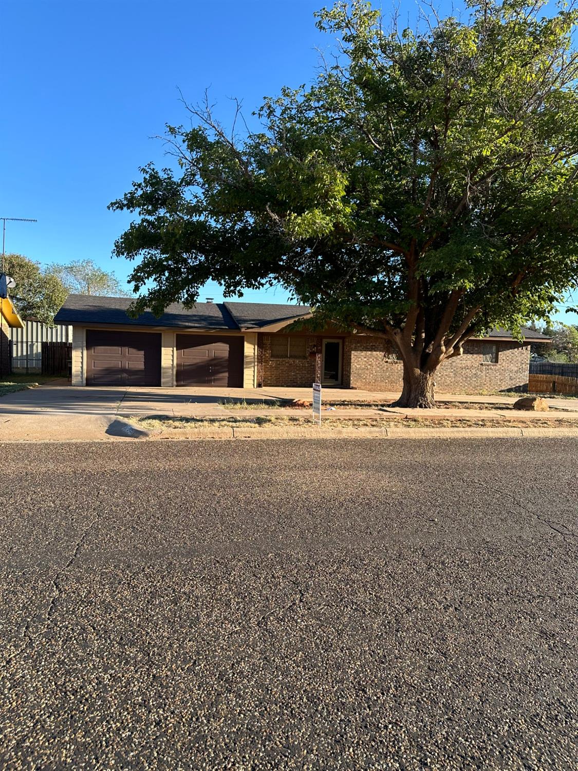 a house with trees in front of it