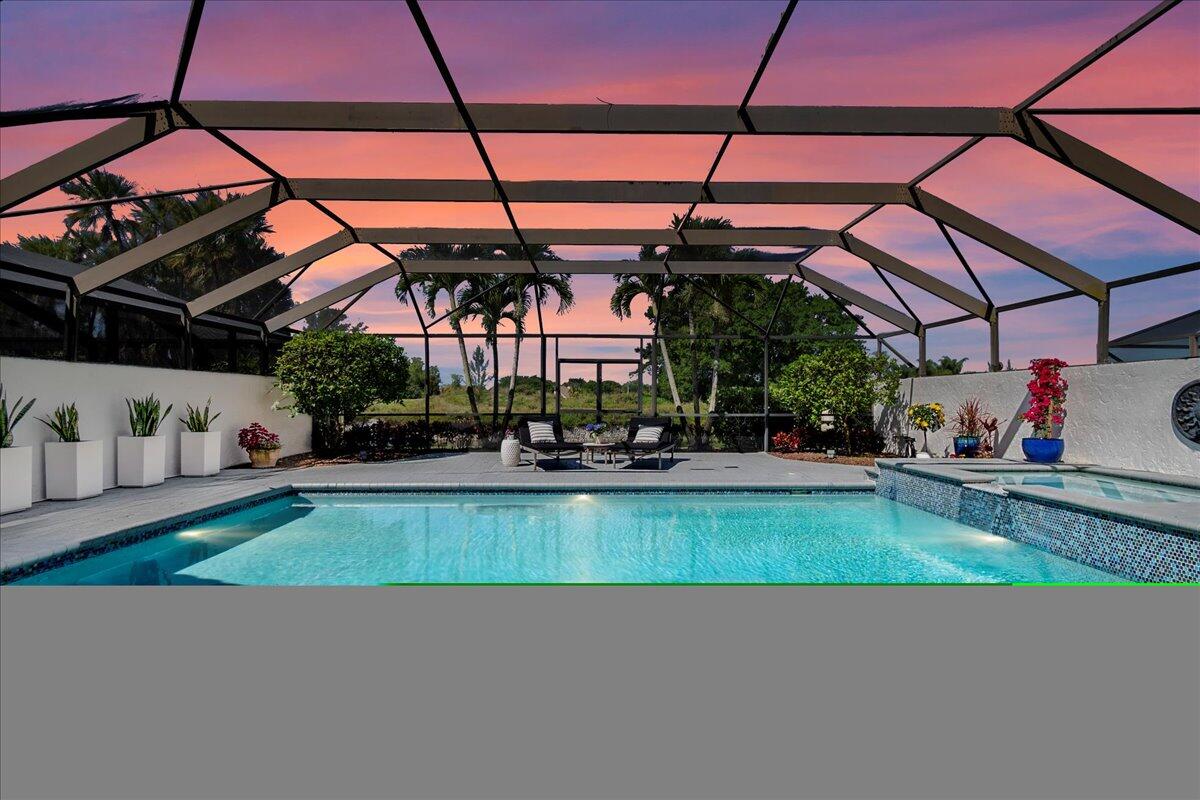 a view of a swimming pool with a patio