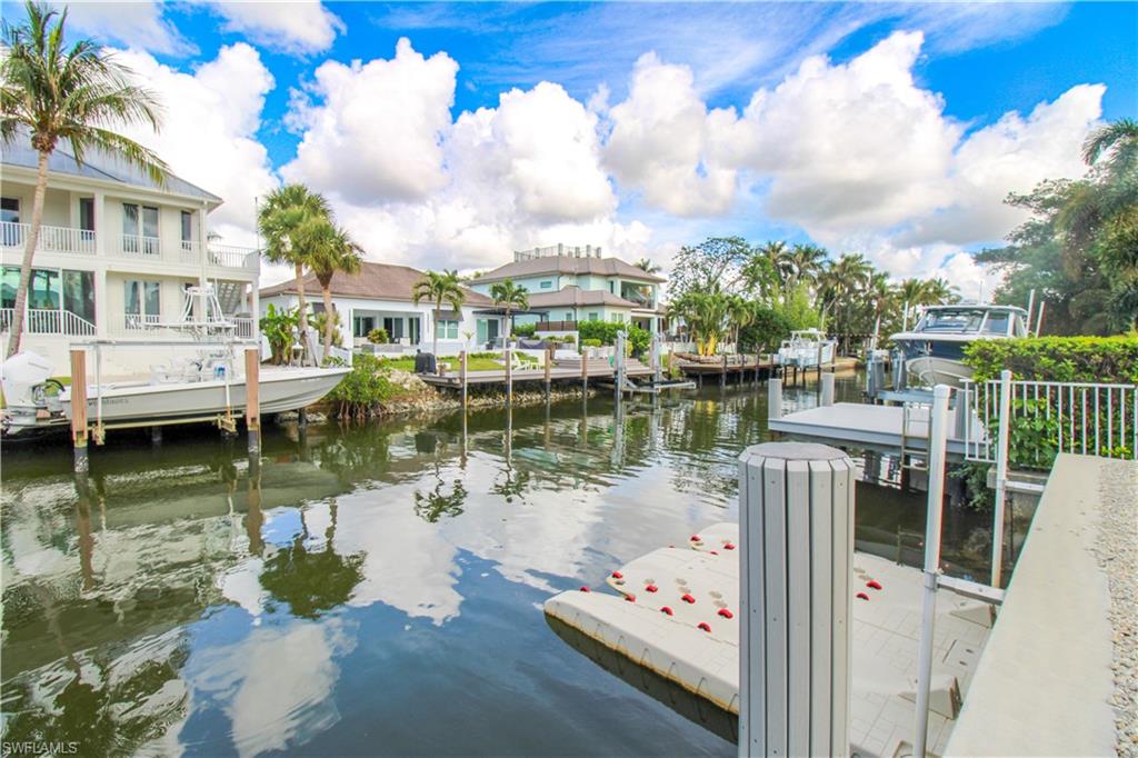 a view of a lake with a house