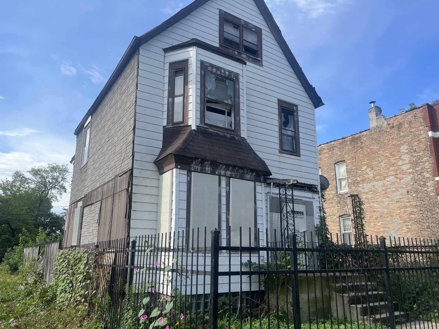 a view of a house with a balcony