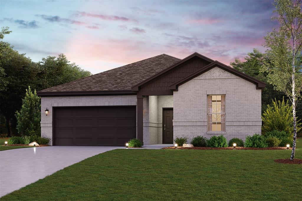 a front view of a house with a garden and garage