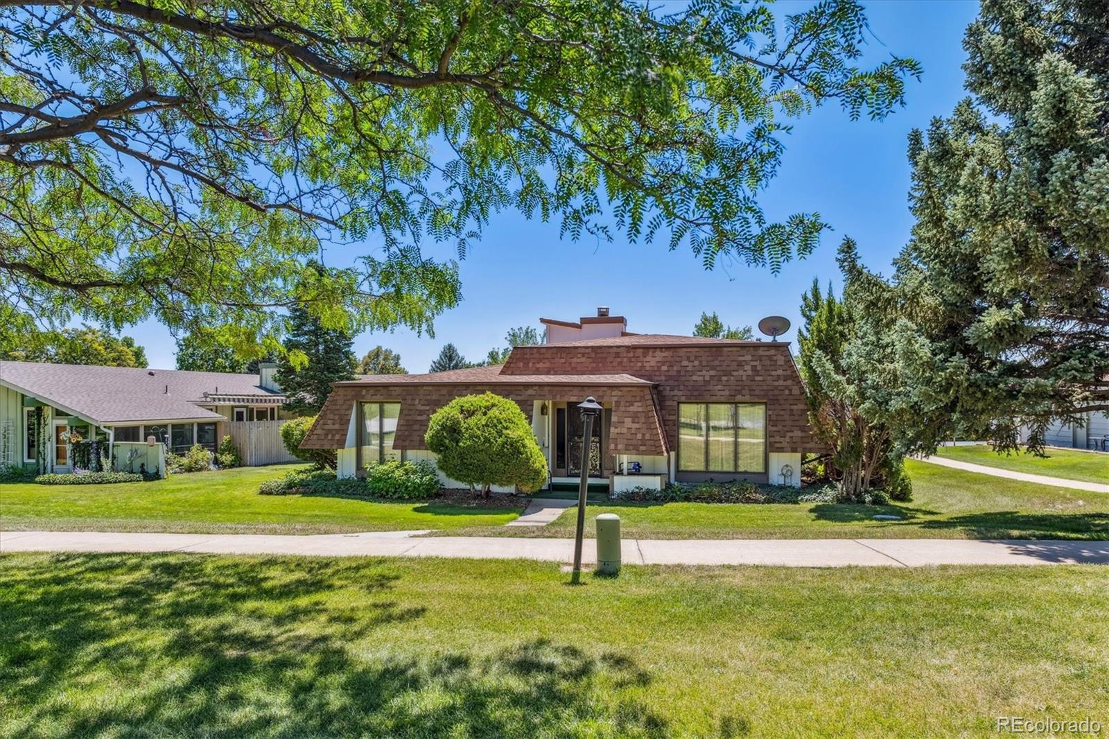 a view of a house with a big yard