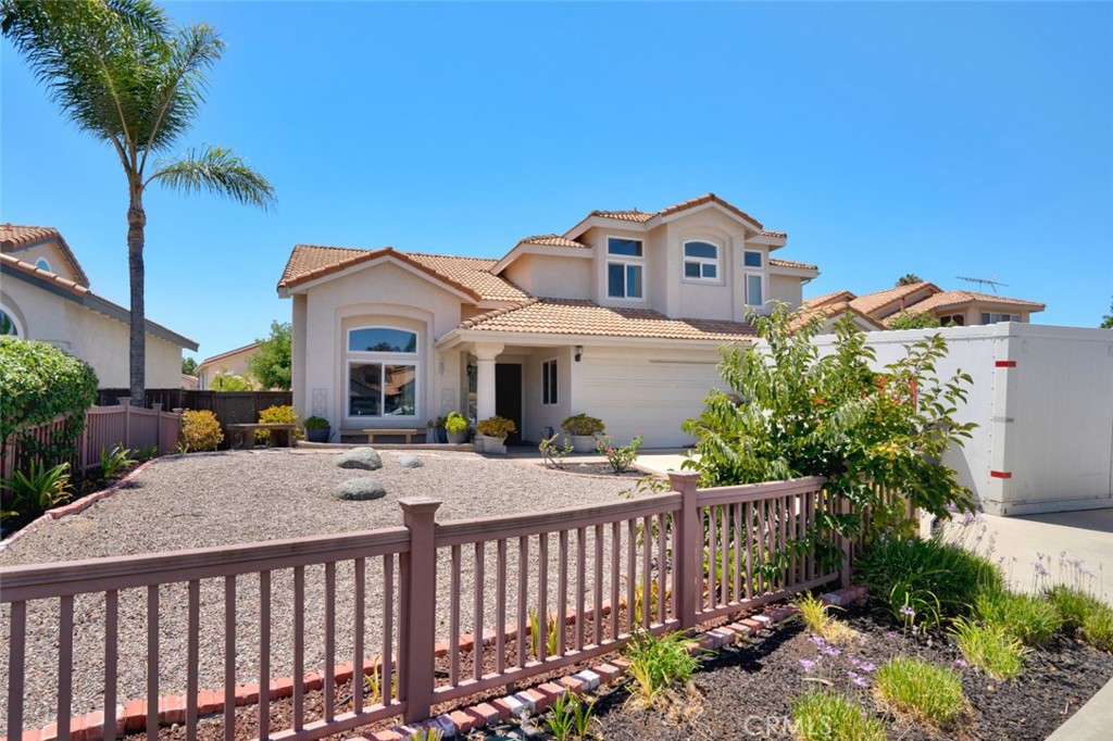 a house view with a garden space