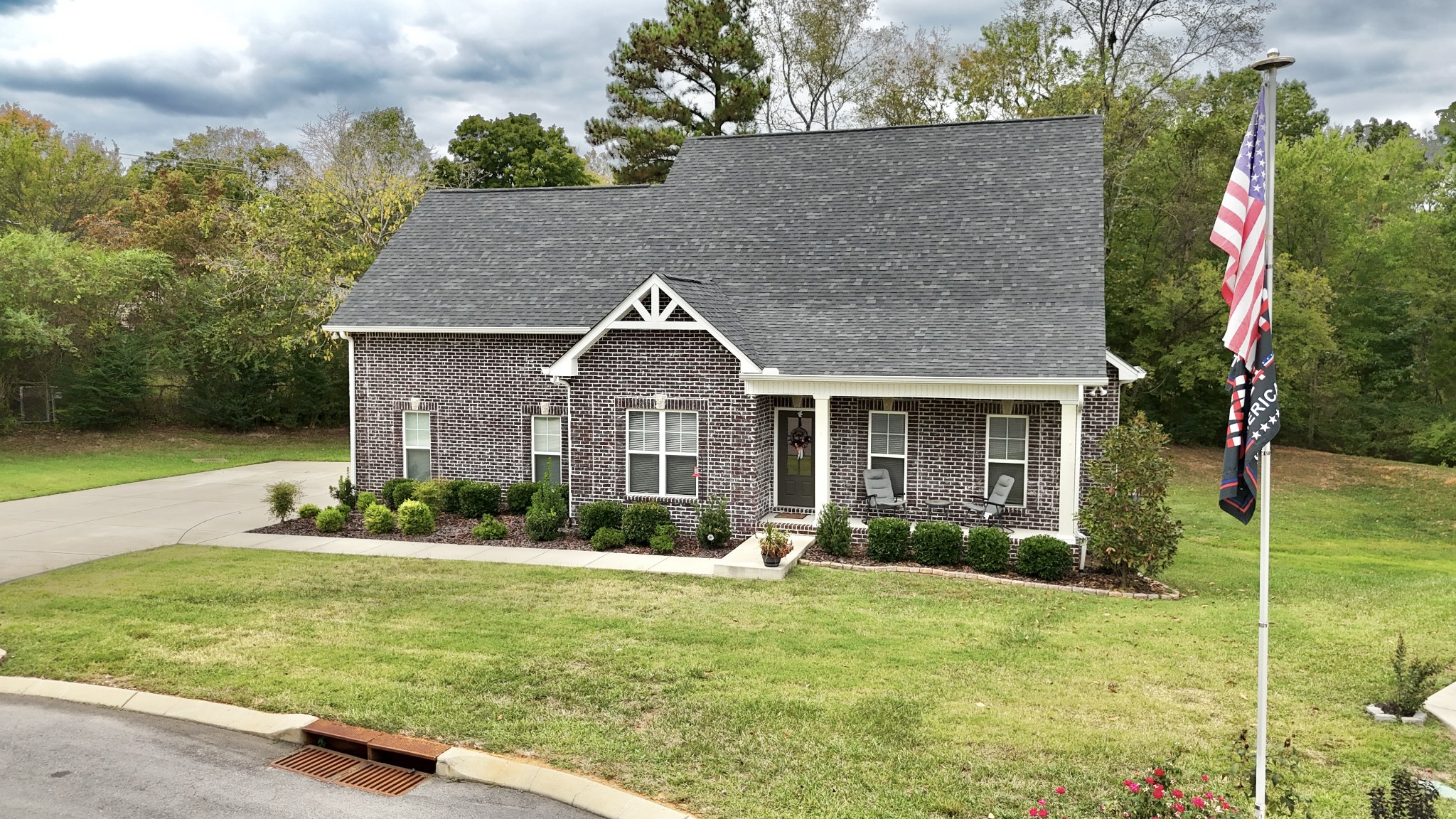 front view of a house with a yard