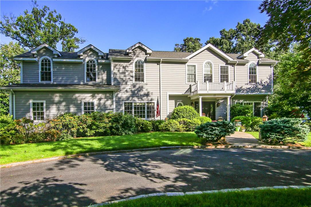 Beautiful Contemporary Colonial with circular driveway