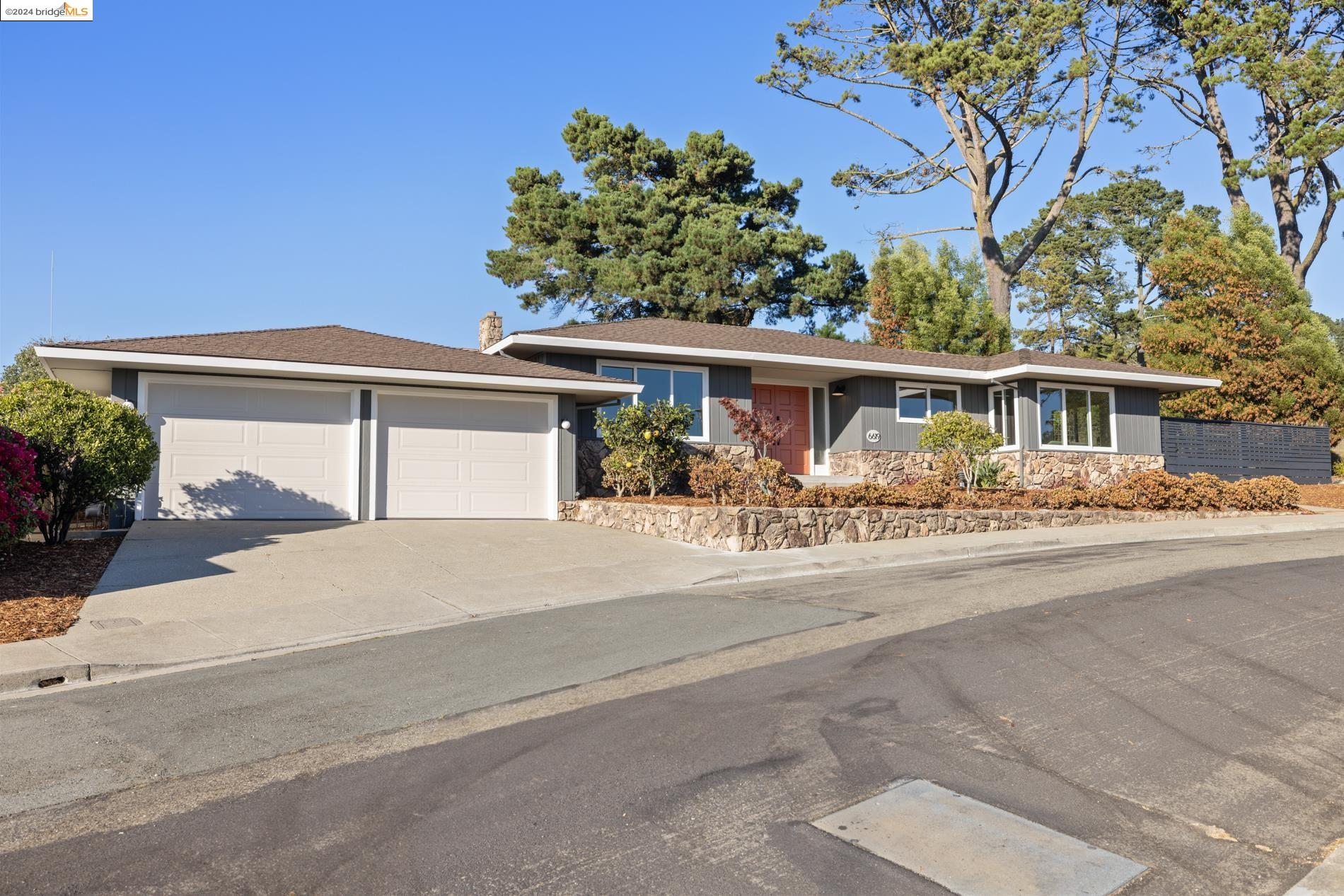 front view of a house with a patio