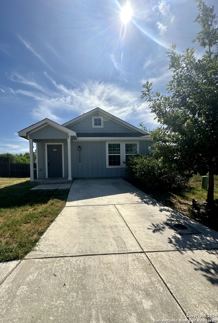 a view of house with outdoor space