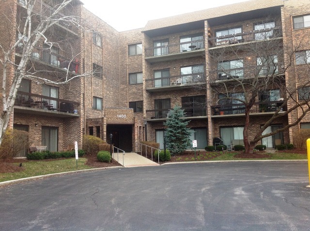 a view of a building with a street