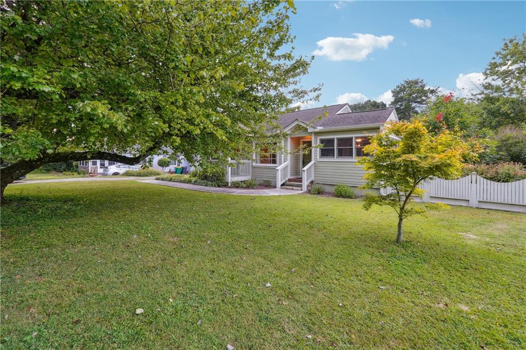 a house view with a garden space