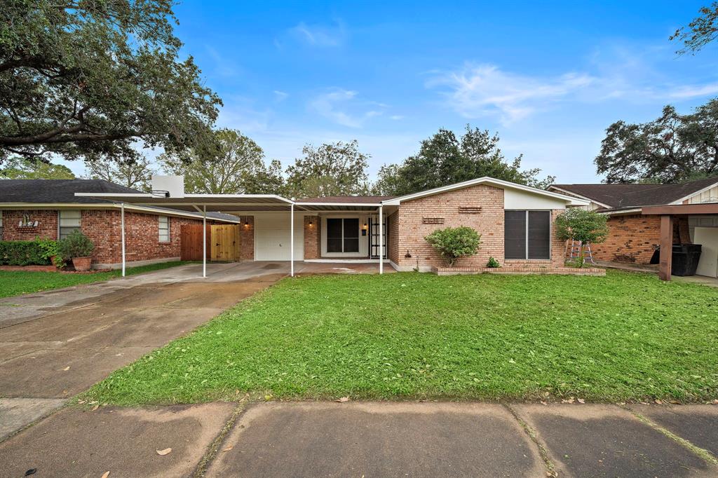 front view of a house and a yard