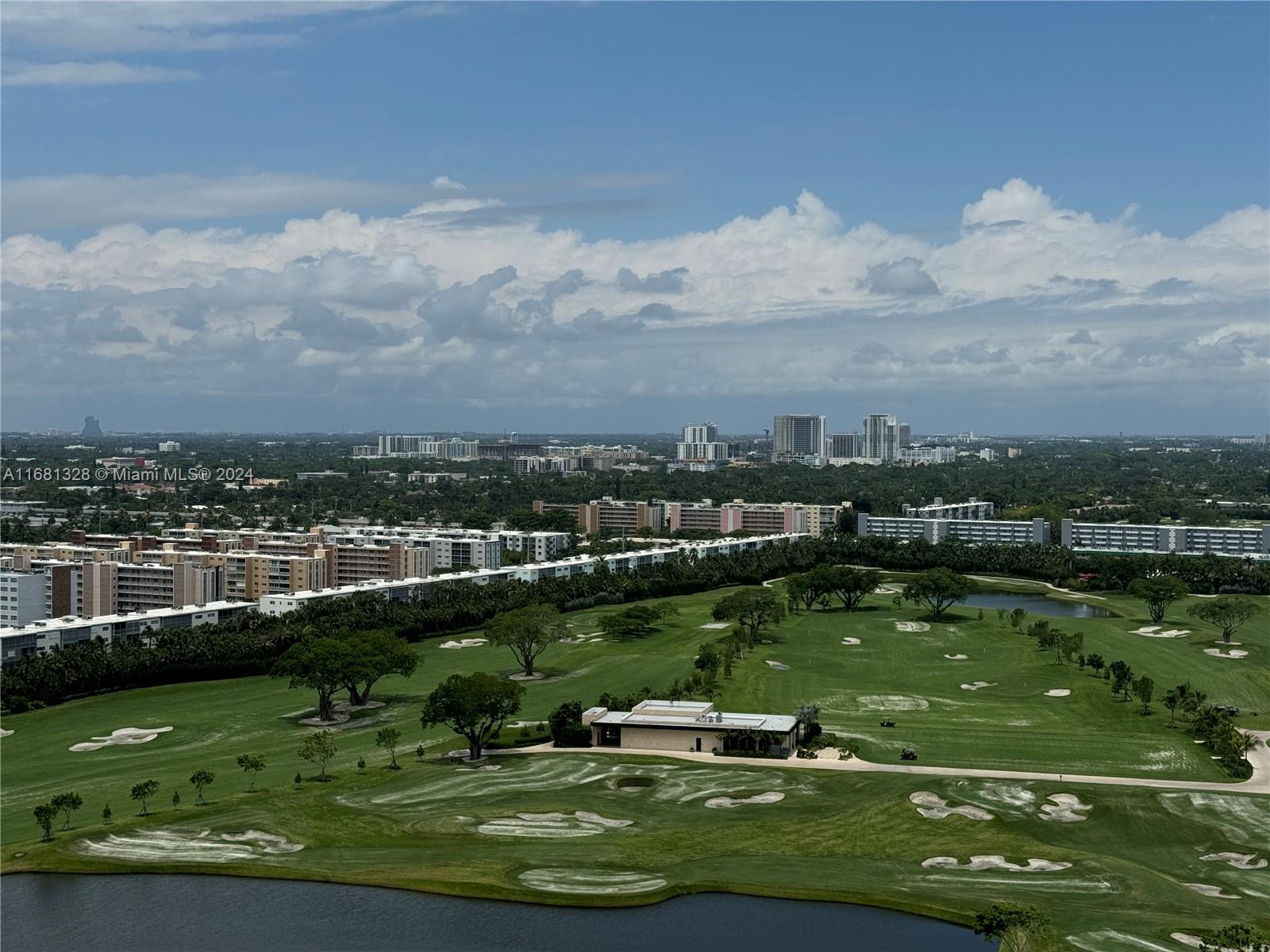 an aerial view of a city with lots of trees