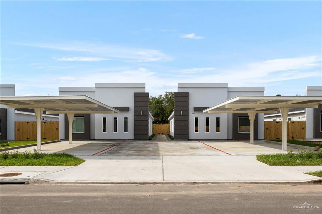 Contemporary home featuring a carport