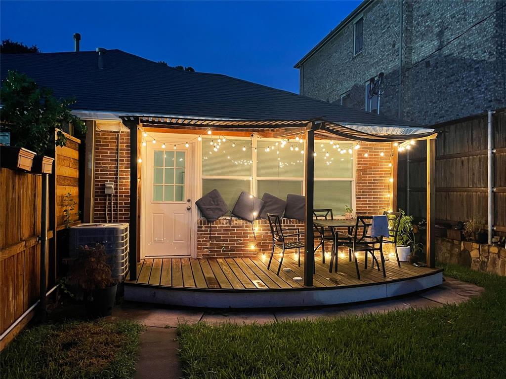 a view of swimming pool with outdoor seating