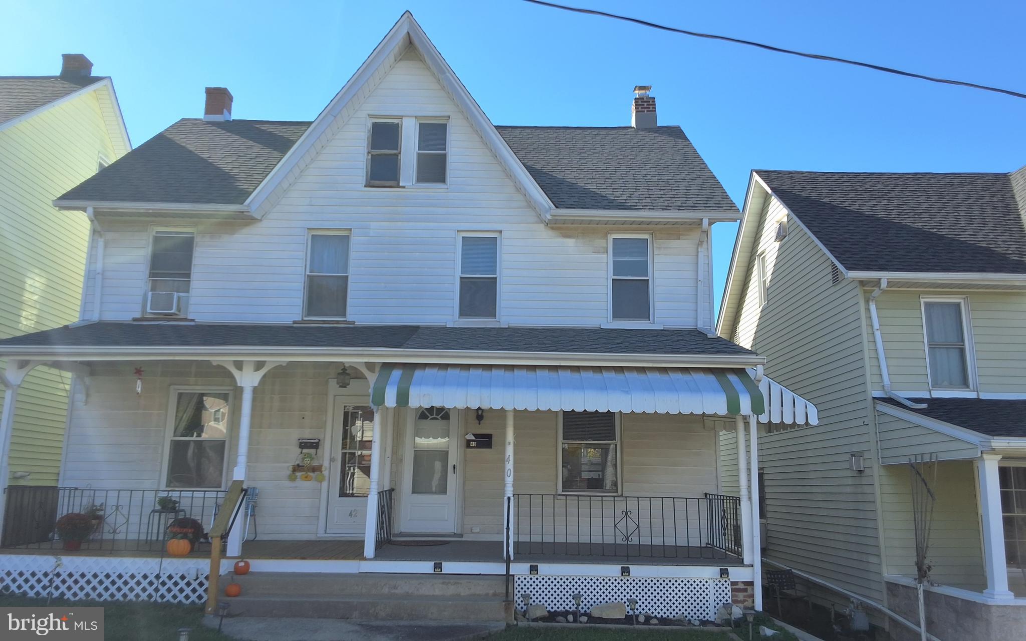 a front view of a house with a garage