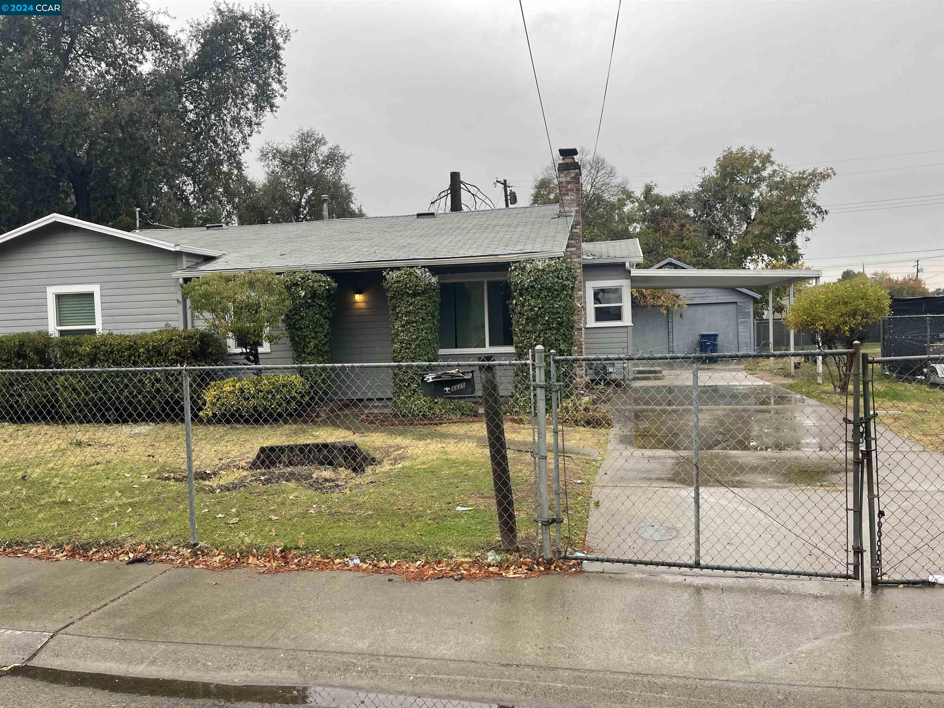 a view of a house with swimming pool