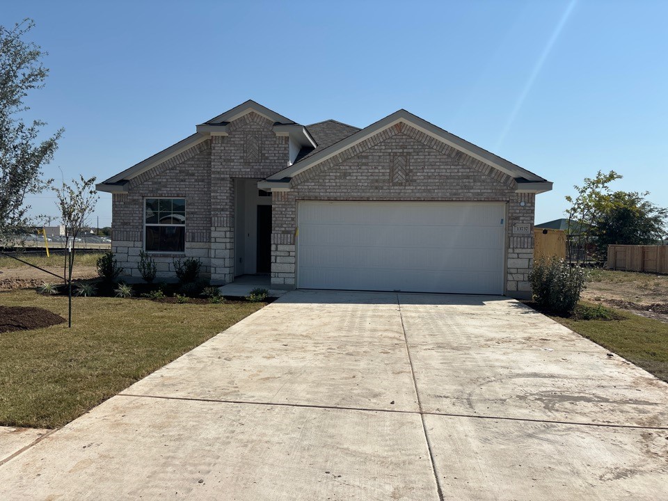 a front view of house with yard