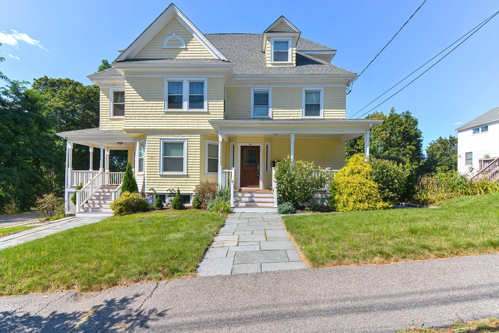 front view of a house and a yard