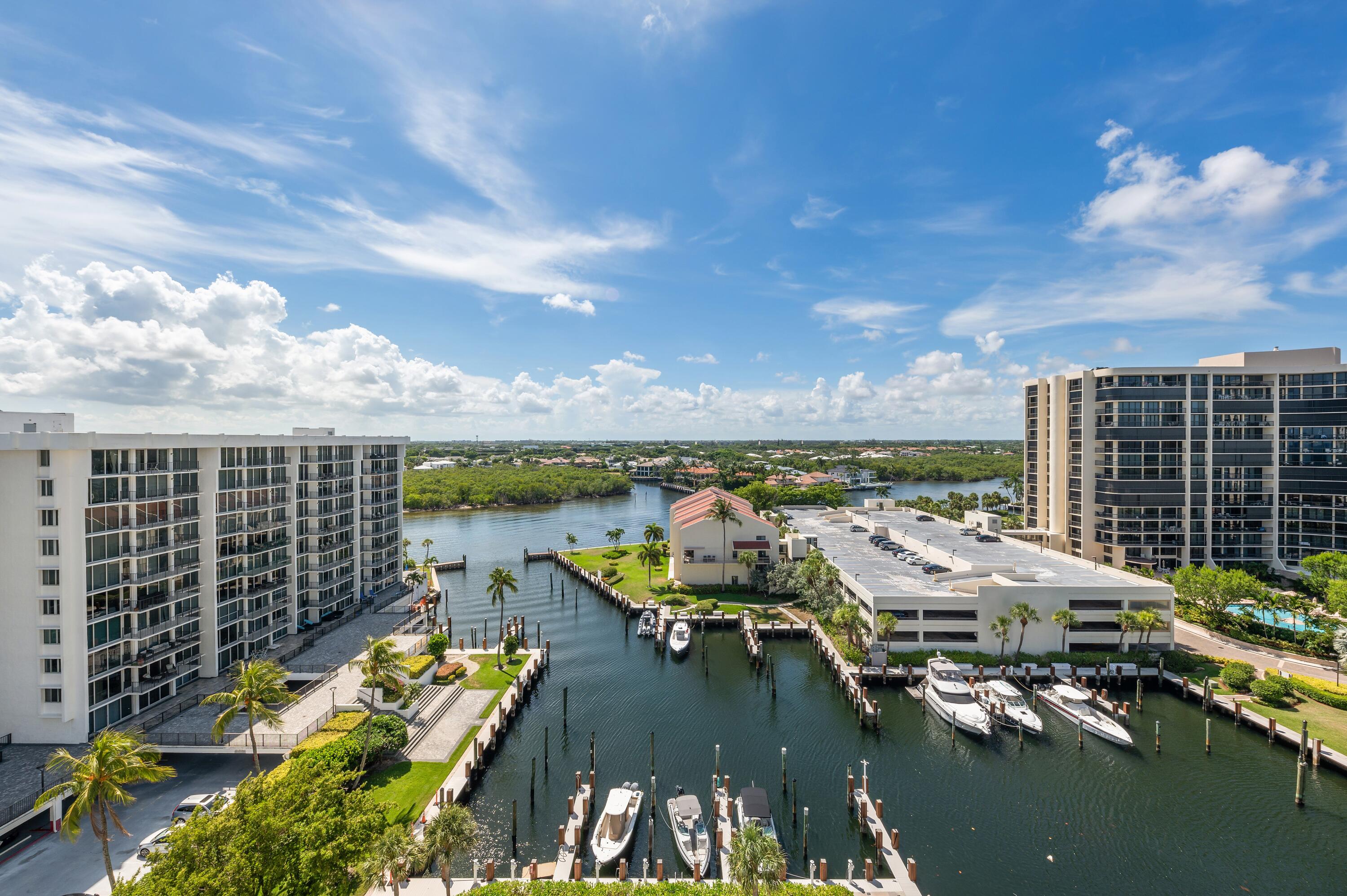 a view of a lake with tall buildings