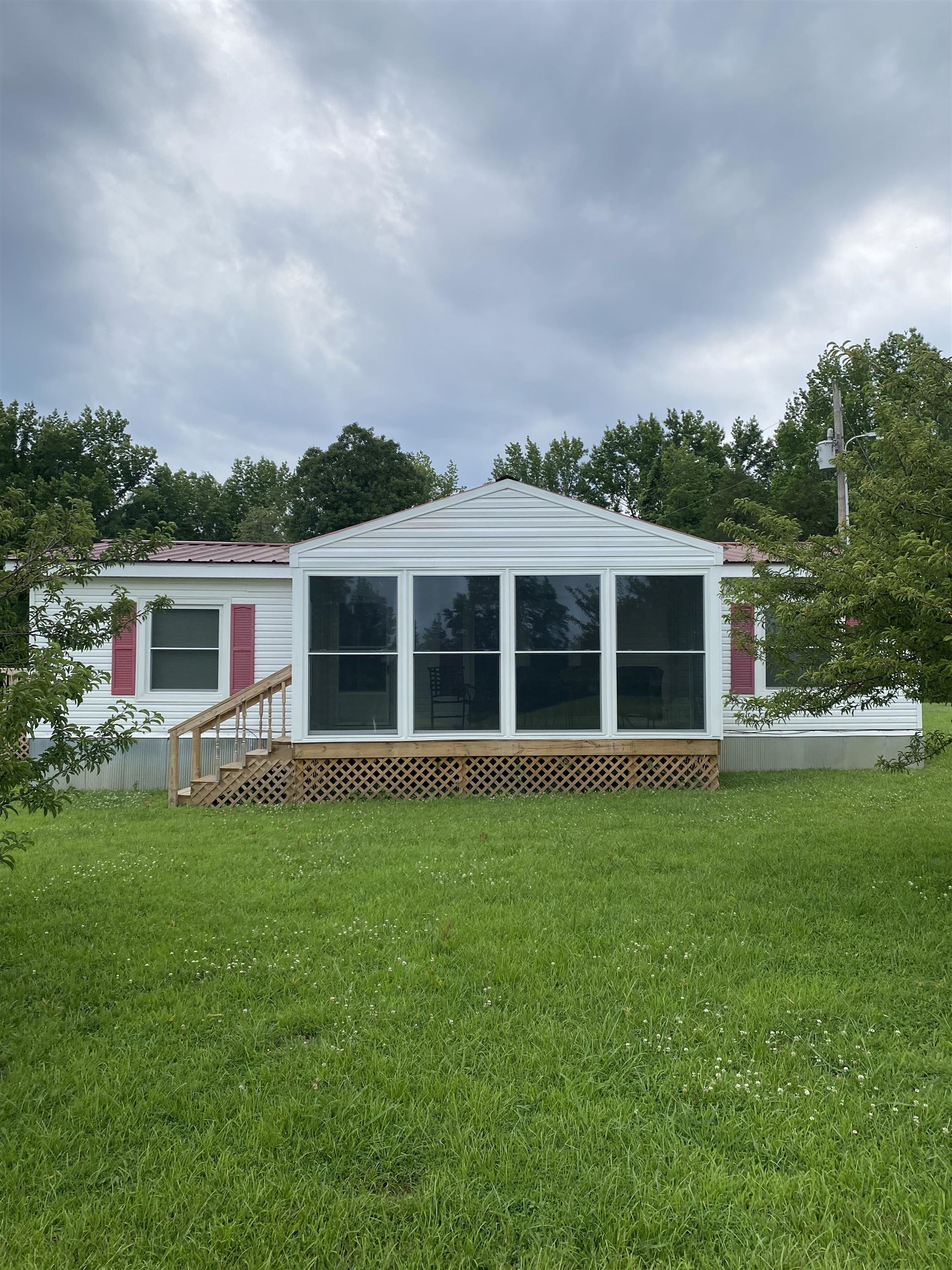 front view of a house with a garden