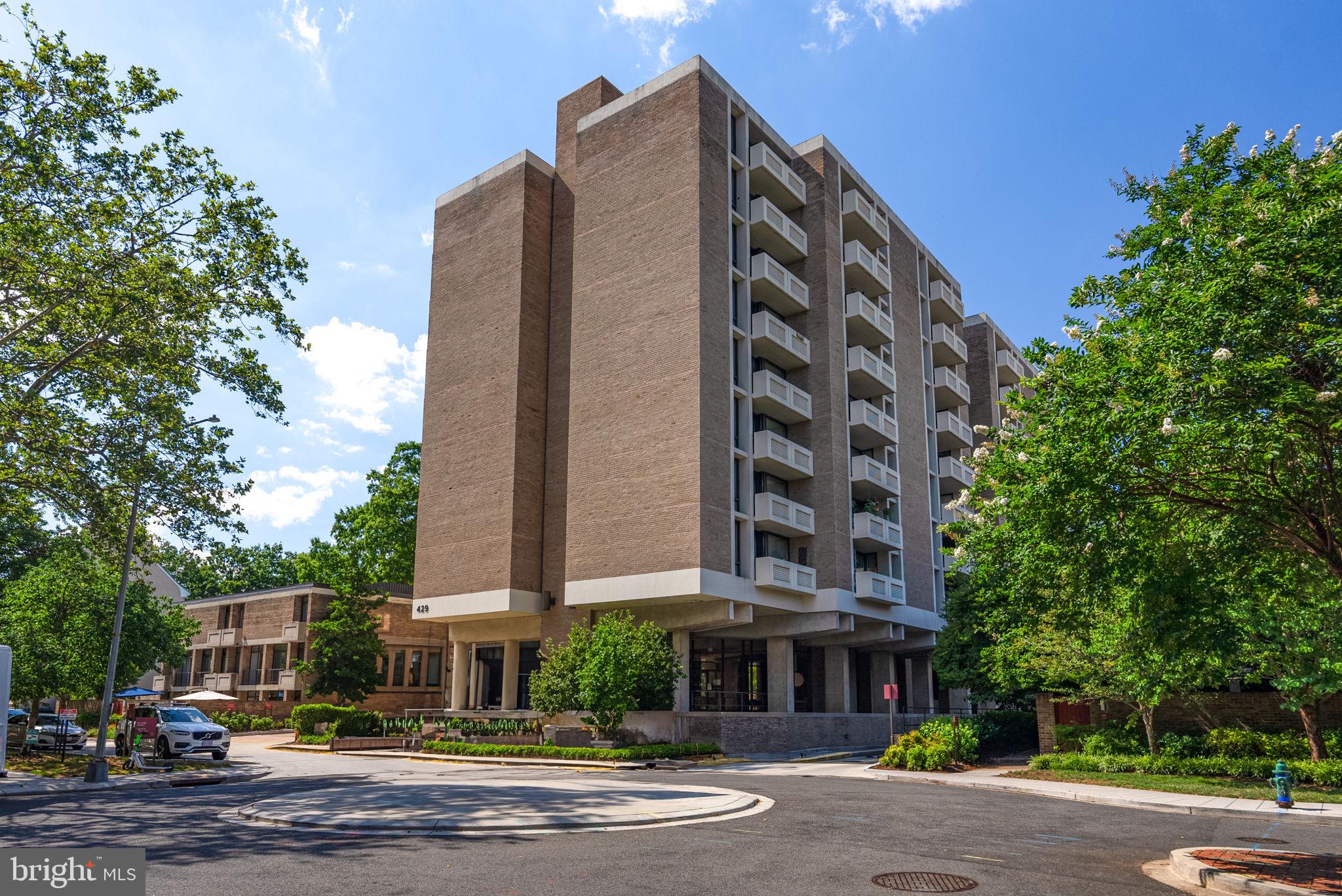 a front view of a building with street view