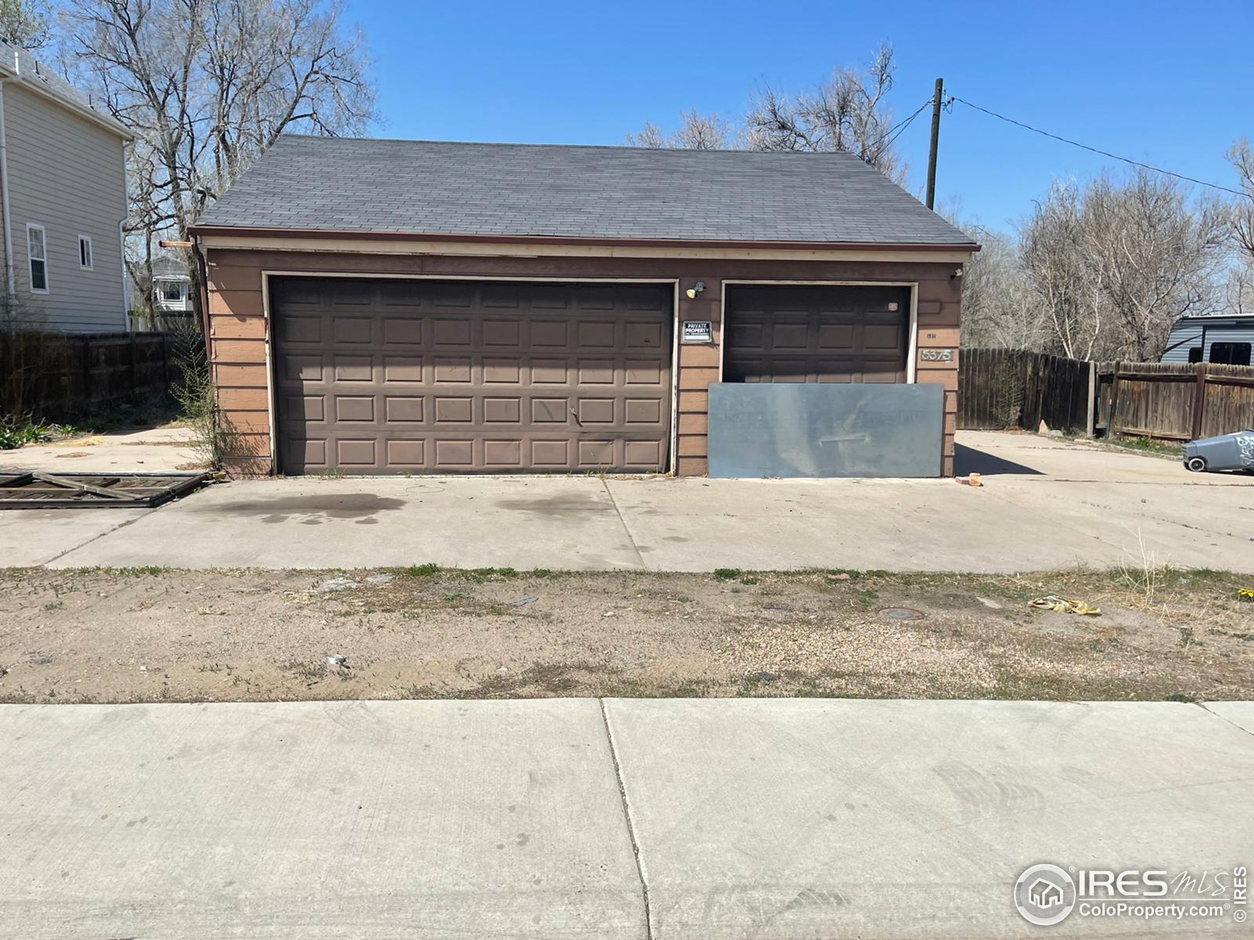 a house with yard in front of it