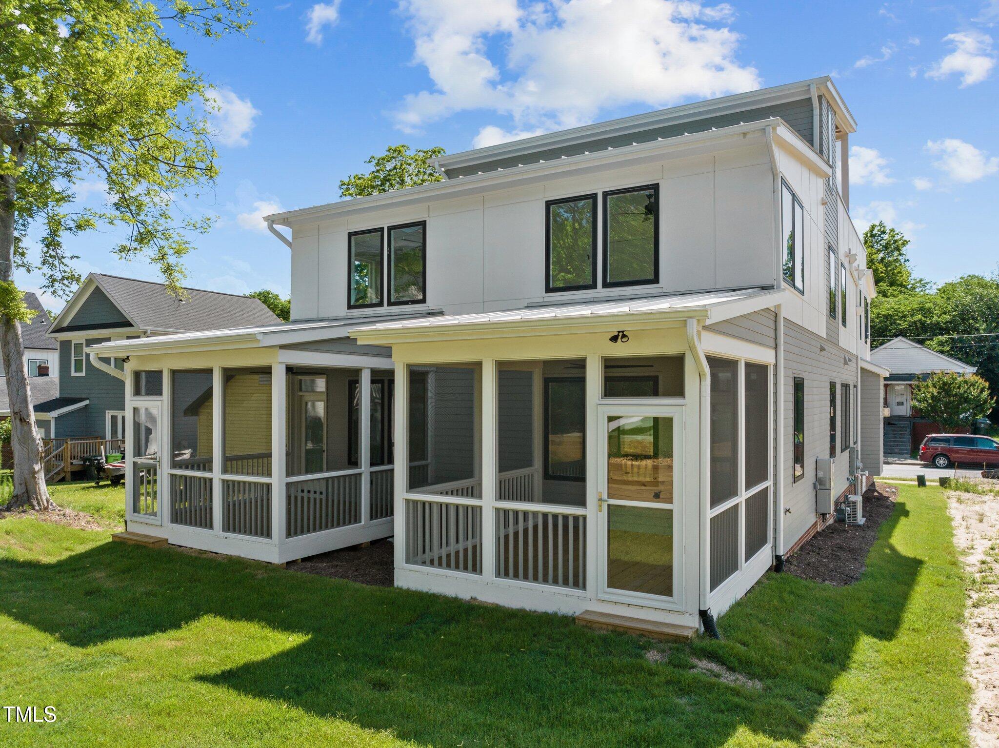 a view of front of house with a yard