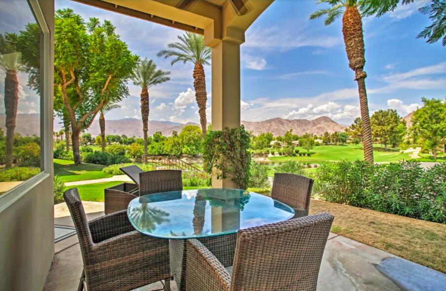 a view of a patio with swimming pool