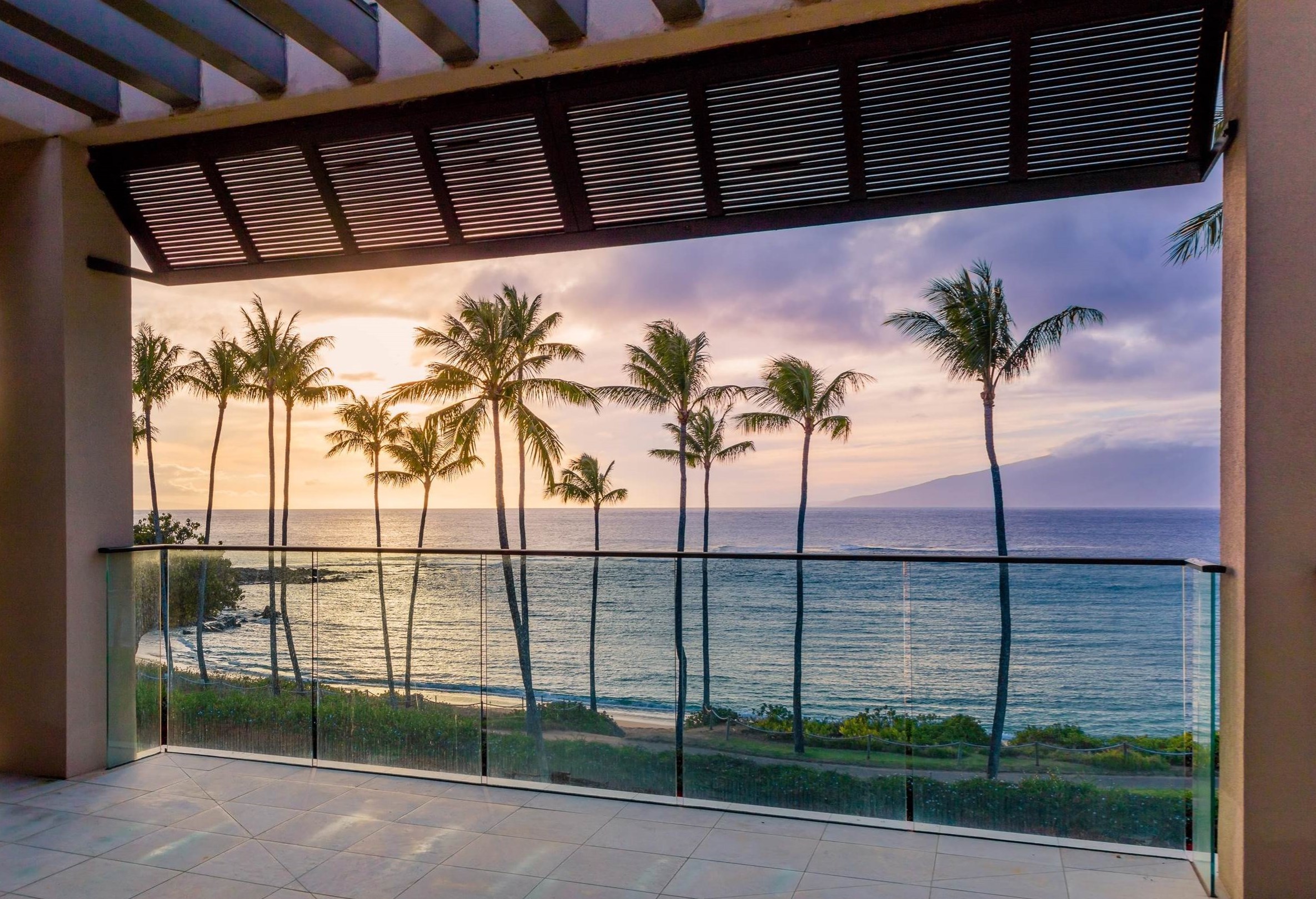 a view of a backyard with a ocean view