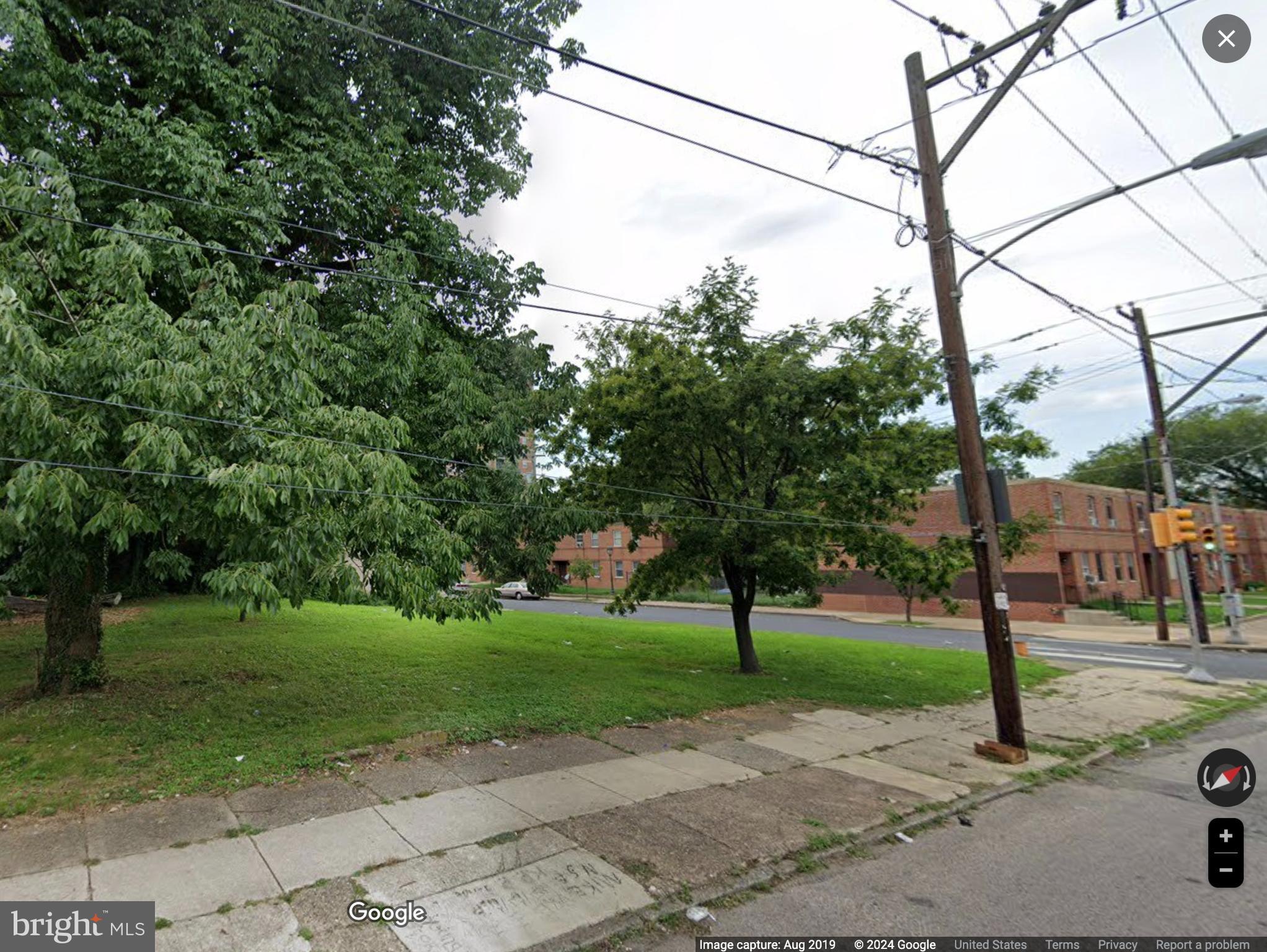 a view of a park with tree s