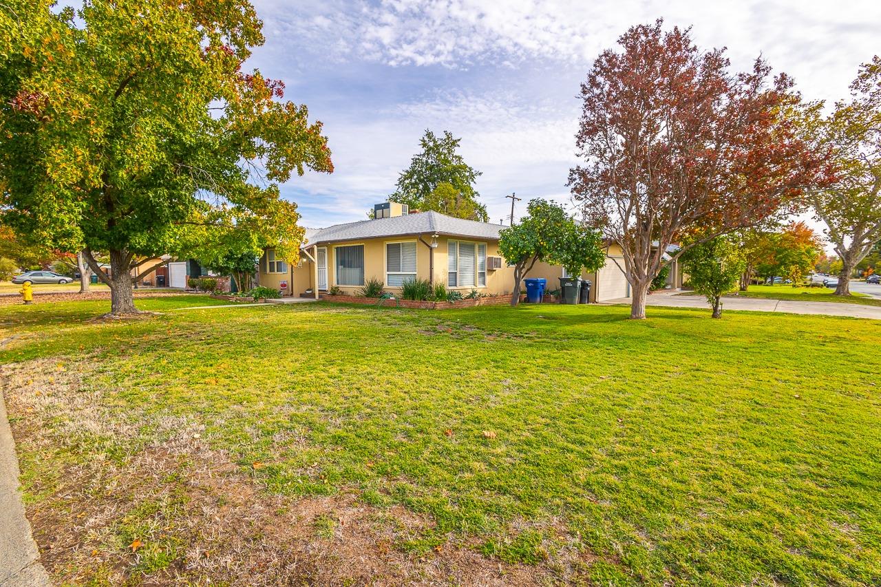 a view of a house with a big yard