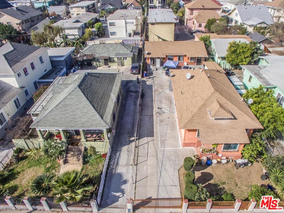 an aerial view of a house with a garden