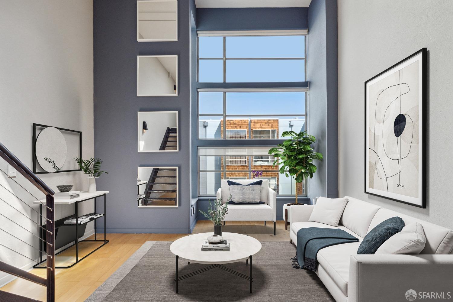 a living room with furniture and a potted plant