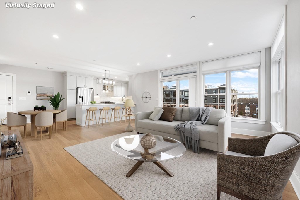 a living room with furniture and a table