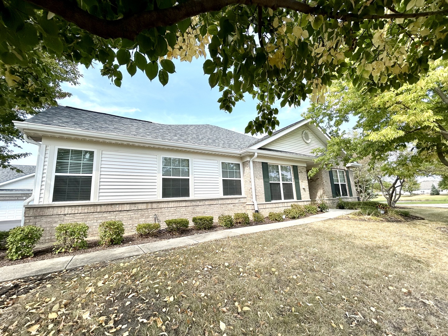 front view of a house with a yard