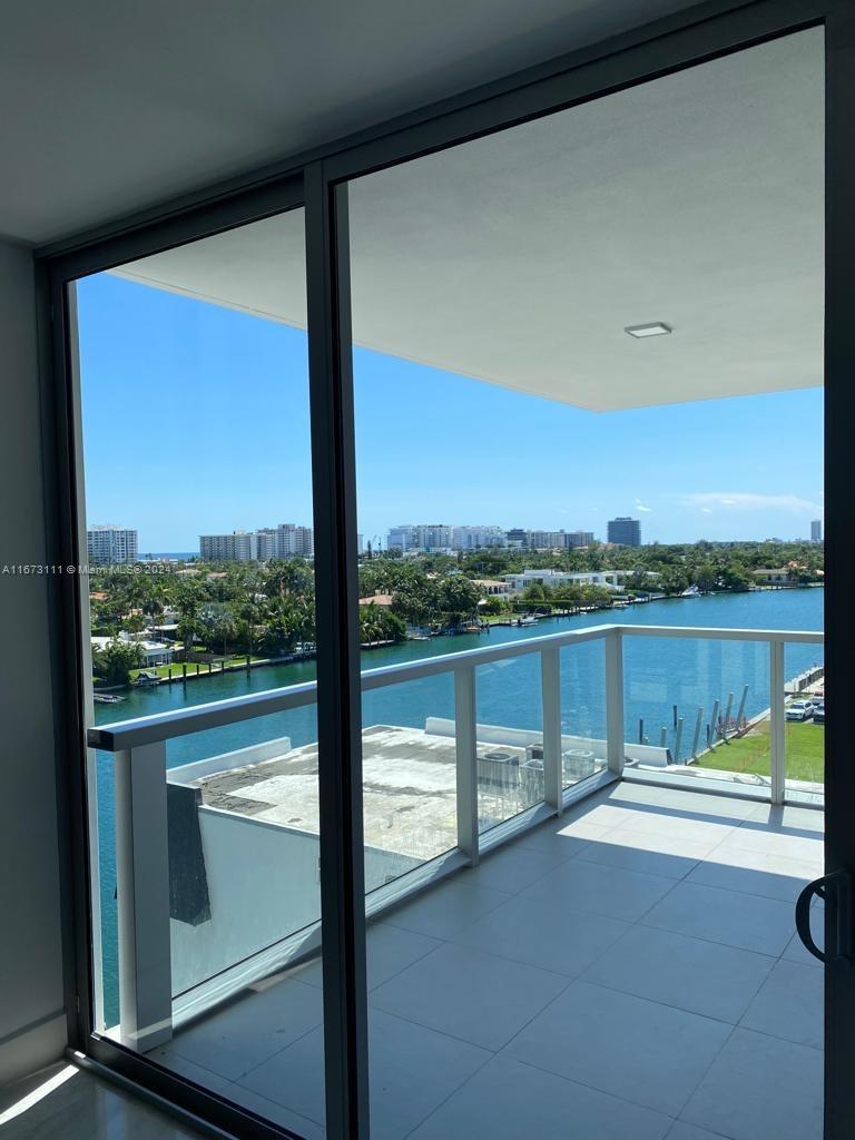 a view of a balcony with lake view