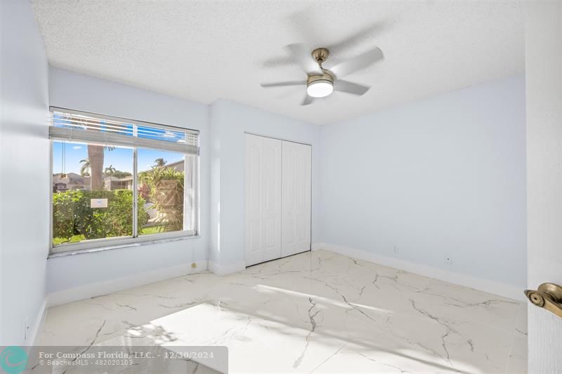 a view of a room with a large window