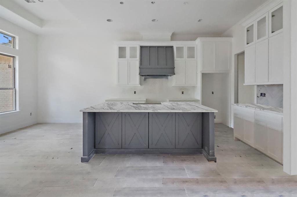 a bathroom with a sink vanity and mirror