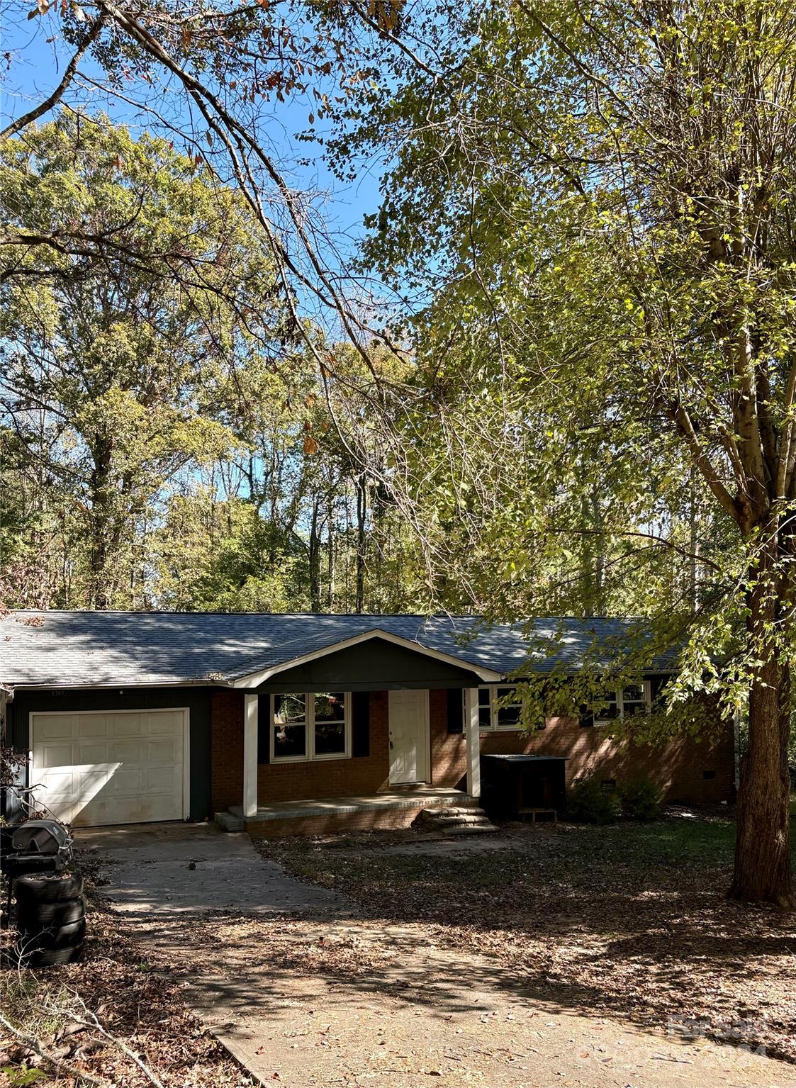 a front view of a house with yard