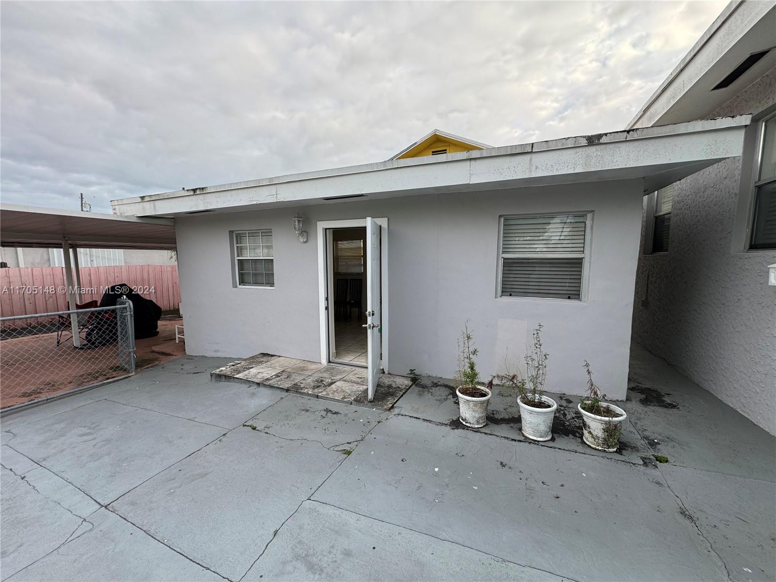 a view of a house with patio